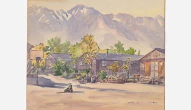 barracks with mountains in background